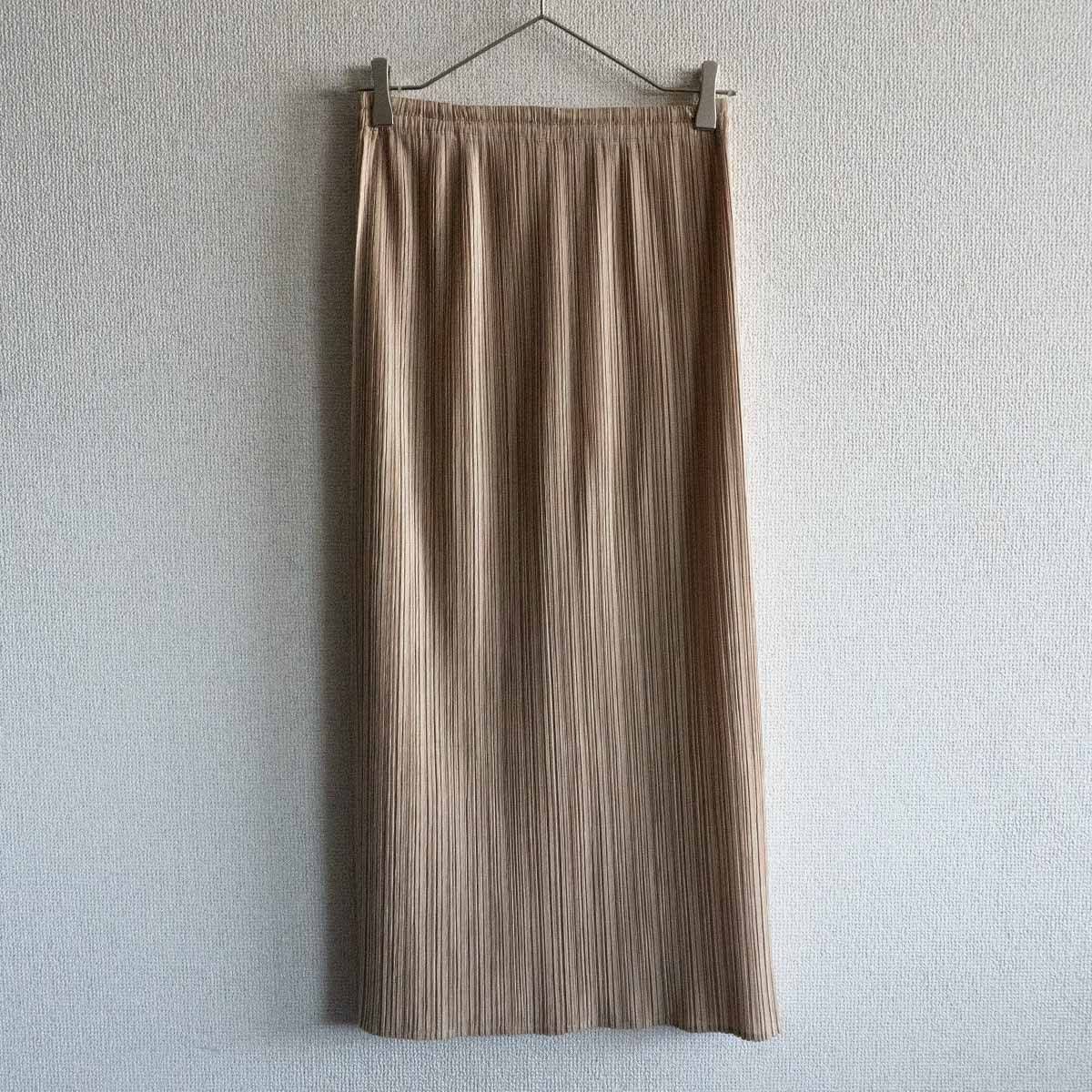 PLEATS PLEASE