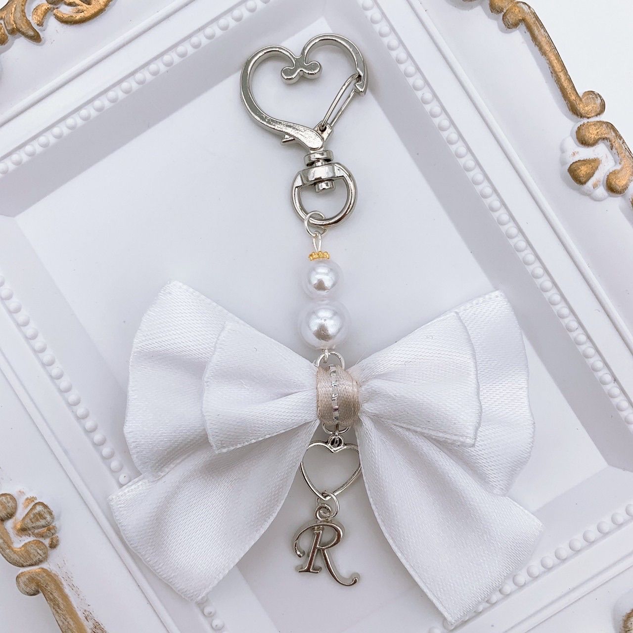 メンカラ＊白リボンチャーム☆ハンドメイド - メルカリ