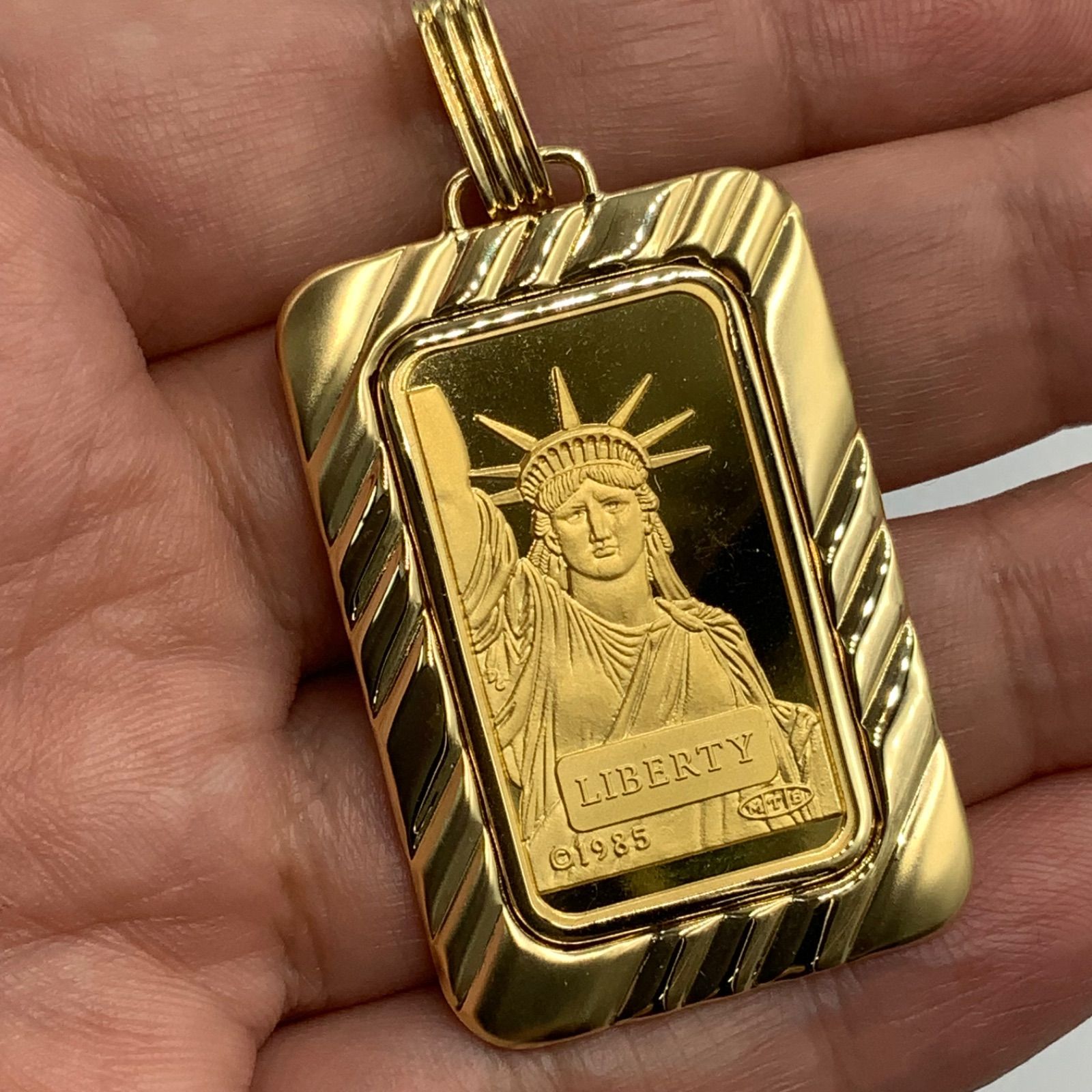 売り切れました。K24 リバティー ペンダントトップ 枠K18 26.3g