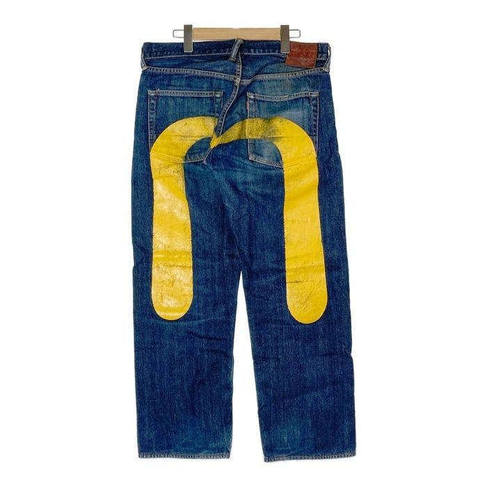 evisu ジーンズ34インチ　イエローグラフィック evisu ジーンズ34インチ イエローグラフィック - メルカリ
