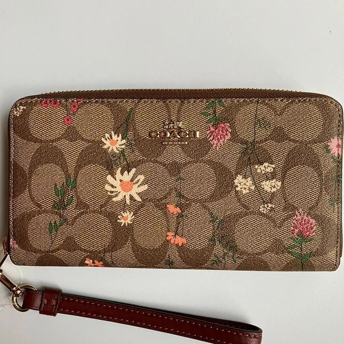 COACH(コーチ) カーキ 花柄 ２つ折り財布 日本未発売 - メルカリ