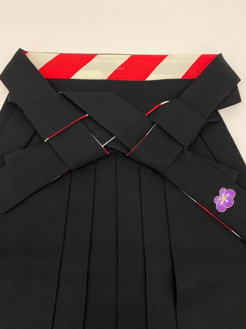 ブランド袴 紅一点 刺繍 椿 黒色 ポリエステル 紐下91cm