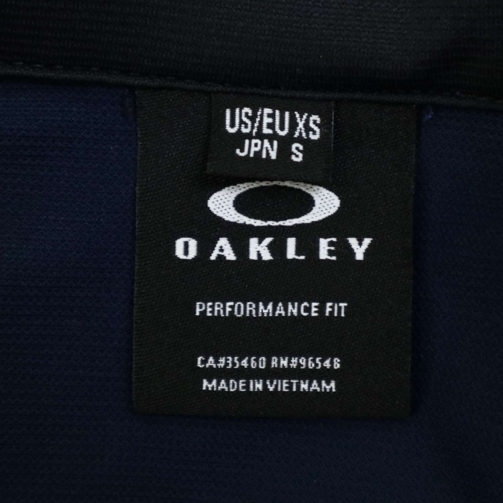 OAKLEY 刺繍　スカル　総柄　半袖　ハーフジップ　ポロシャツ OAKLEY スカルロゴ刺繍 ゴルフウェア ロゴ入り 半袖ポロシャツM