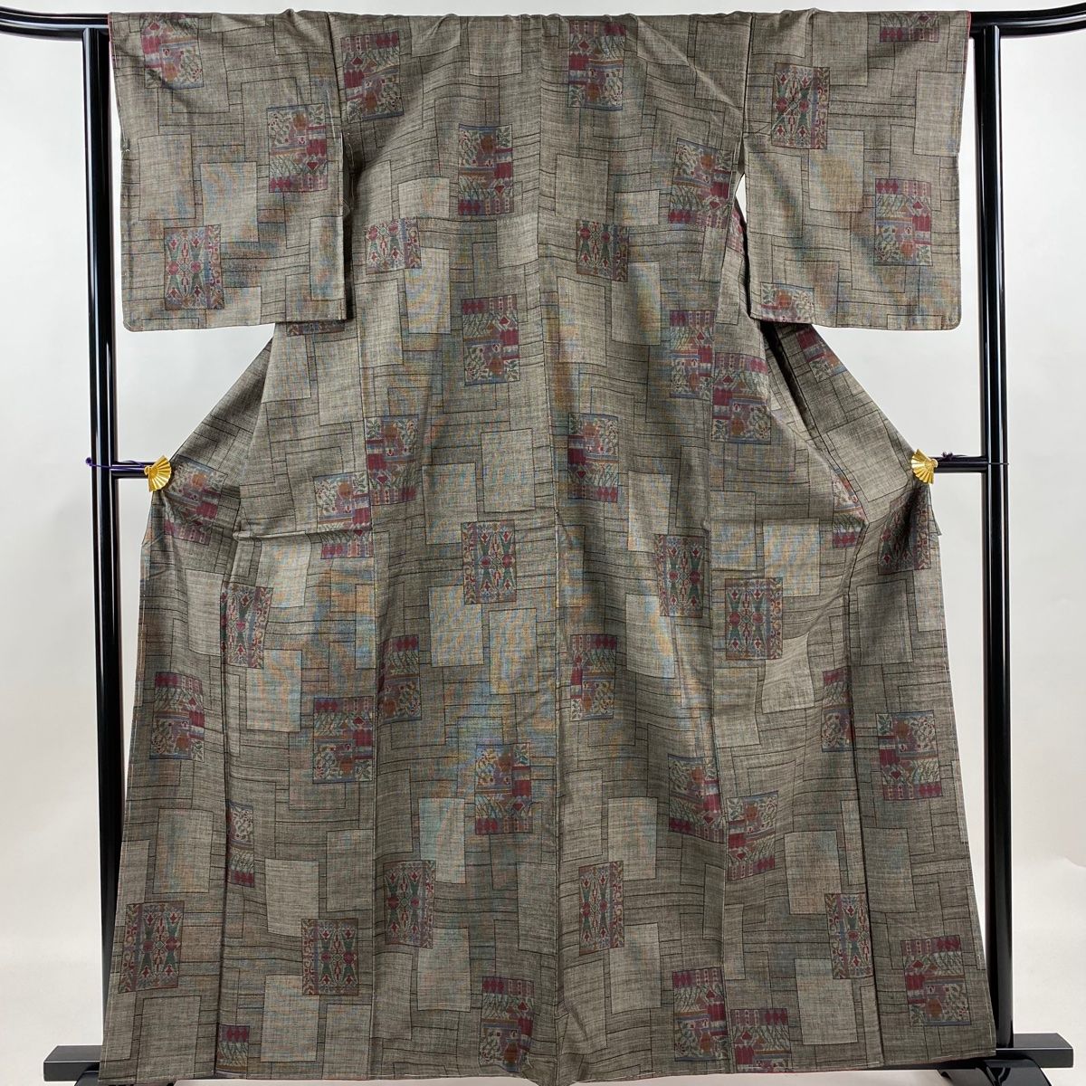 紬 身丈162cm 裄丈64cm M 袷 草花 幾何学模様 焦茶色 正絹 名品