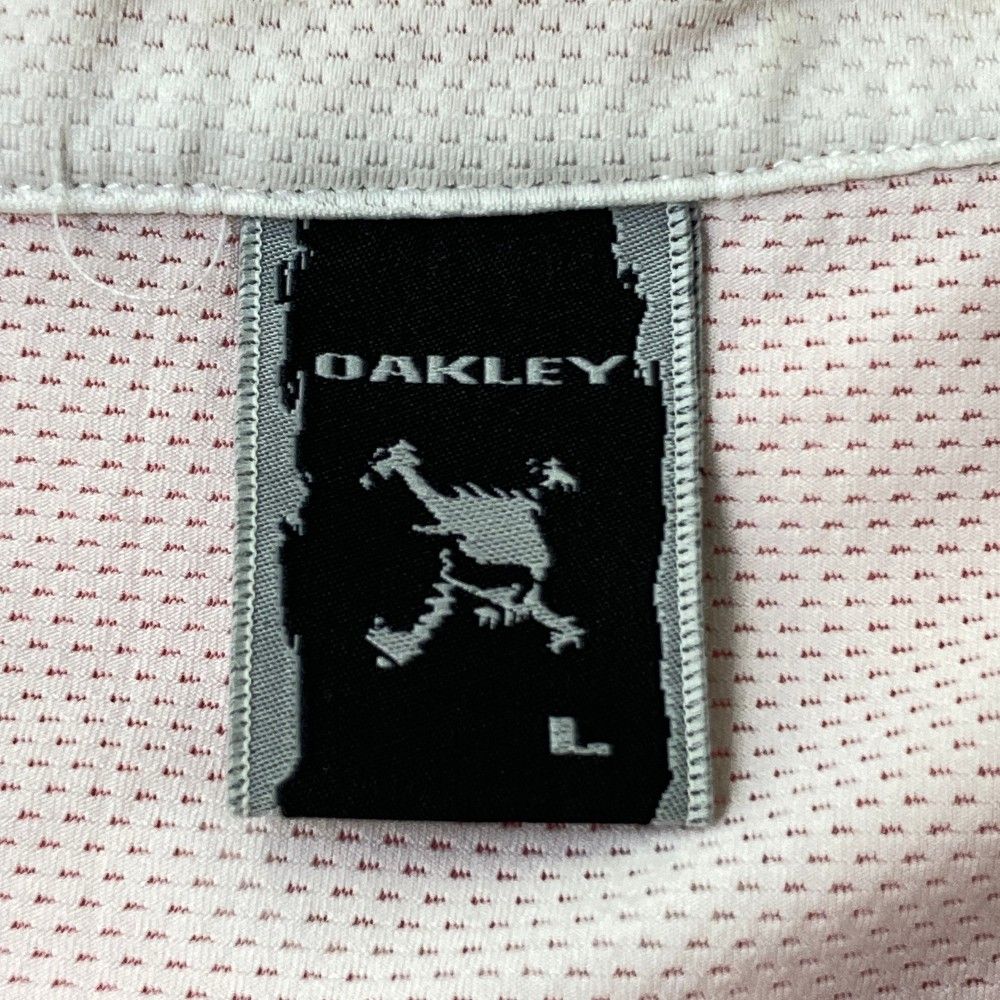 サイズ：L OAKLEY オークリー 半袖ポロシャツ スカル総柄 ピンク