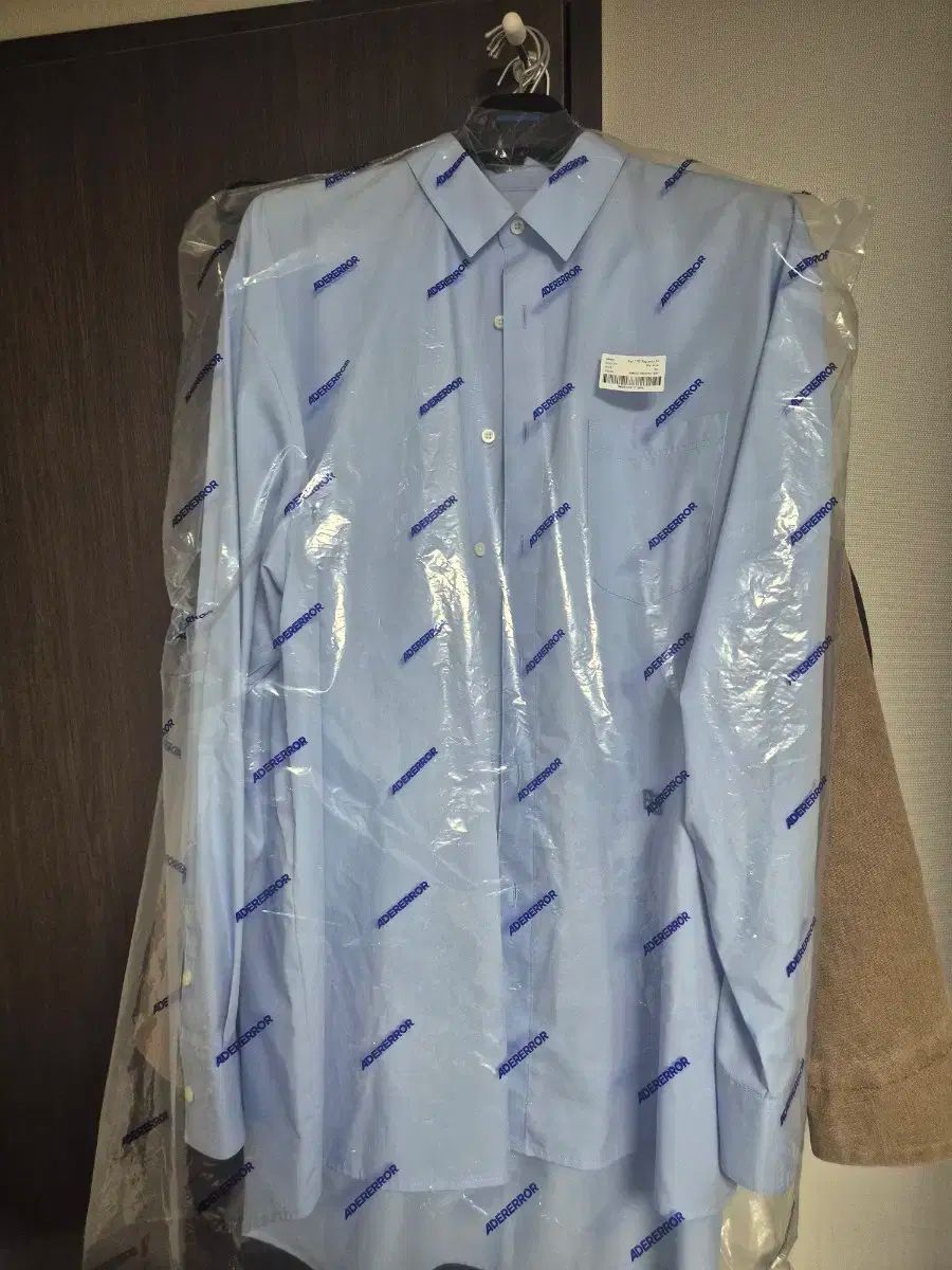 ADER ERROR アーダーエラー TRS タグ シャツ スカイブルー