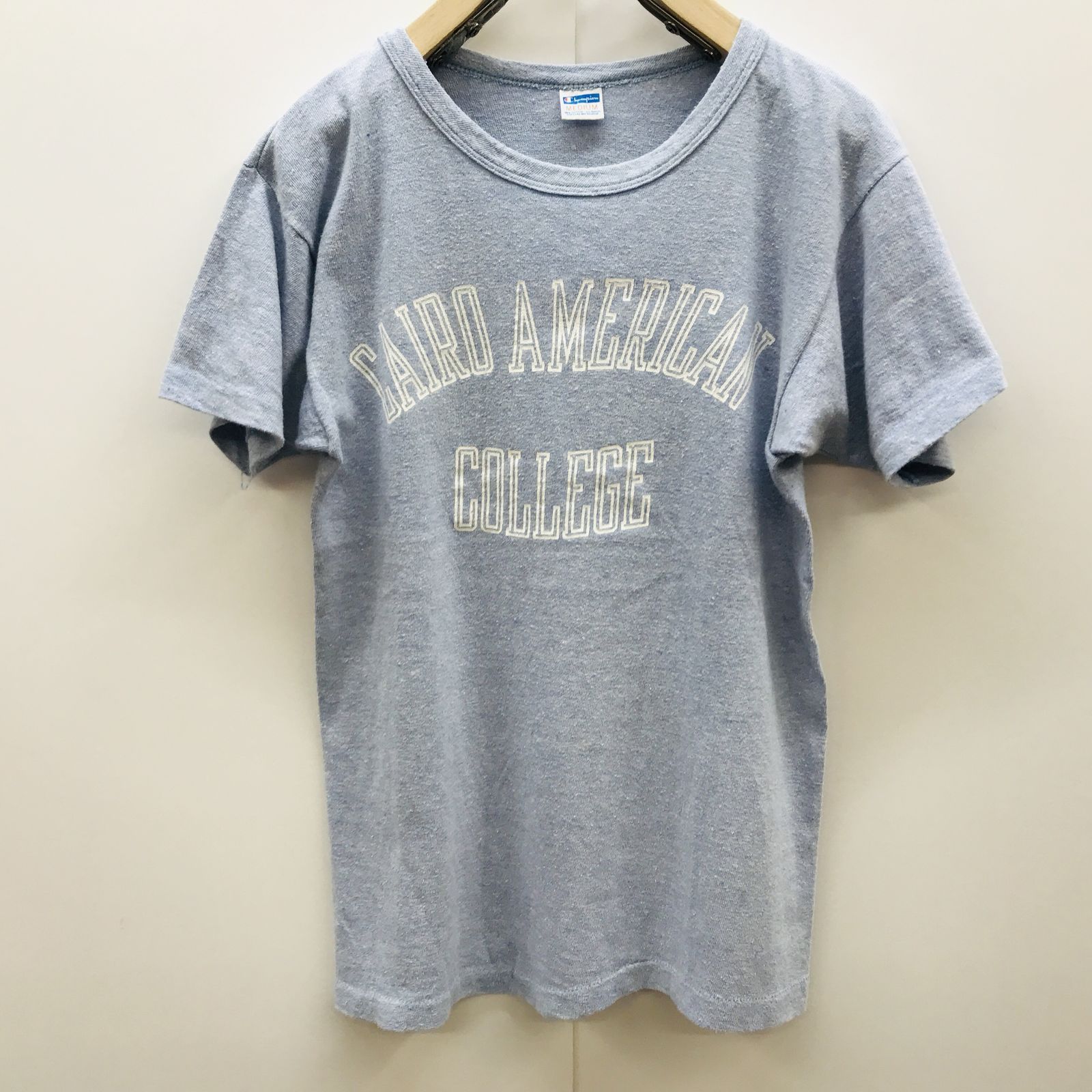 【物流センター】 中古 Champion | チャンピオン 半袖Ｔシャツ 美品！チャンピオン 70?80年代 88/12 後期バータグ カイロアメリカンカレッジプリント ビンテージＴシャツ  アッシュブルー 杢ブル
