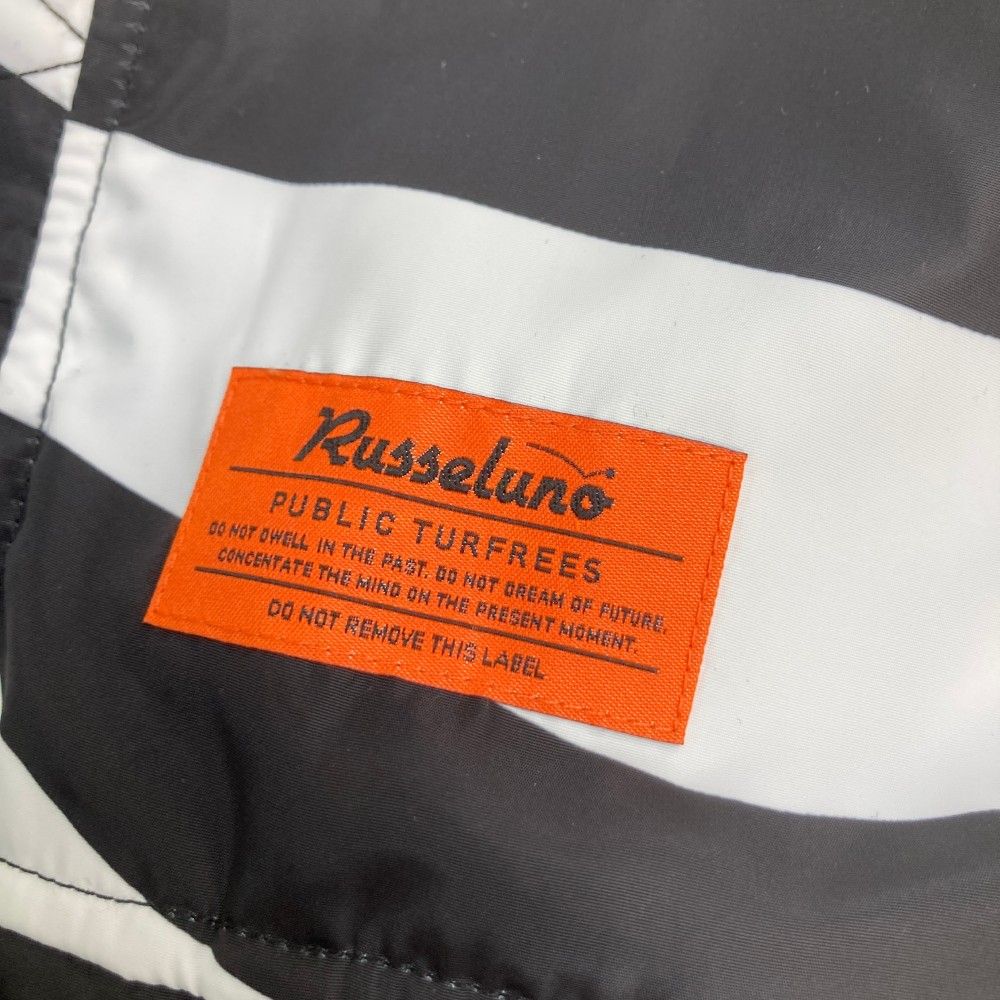 サイズ：5 RUSSELUNO ラッセルノ  リバーシブルジップジャケット ルチャ ゼブラ柄 ブラック系 [240101417366] ゴルフウェア メンズ ストスト サイズ：5 RUSSELUNO ラッセルノ リバーシブルジップジャケット
