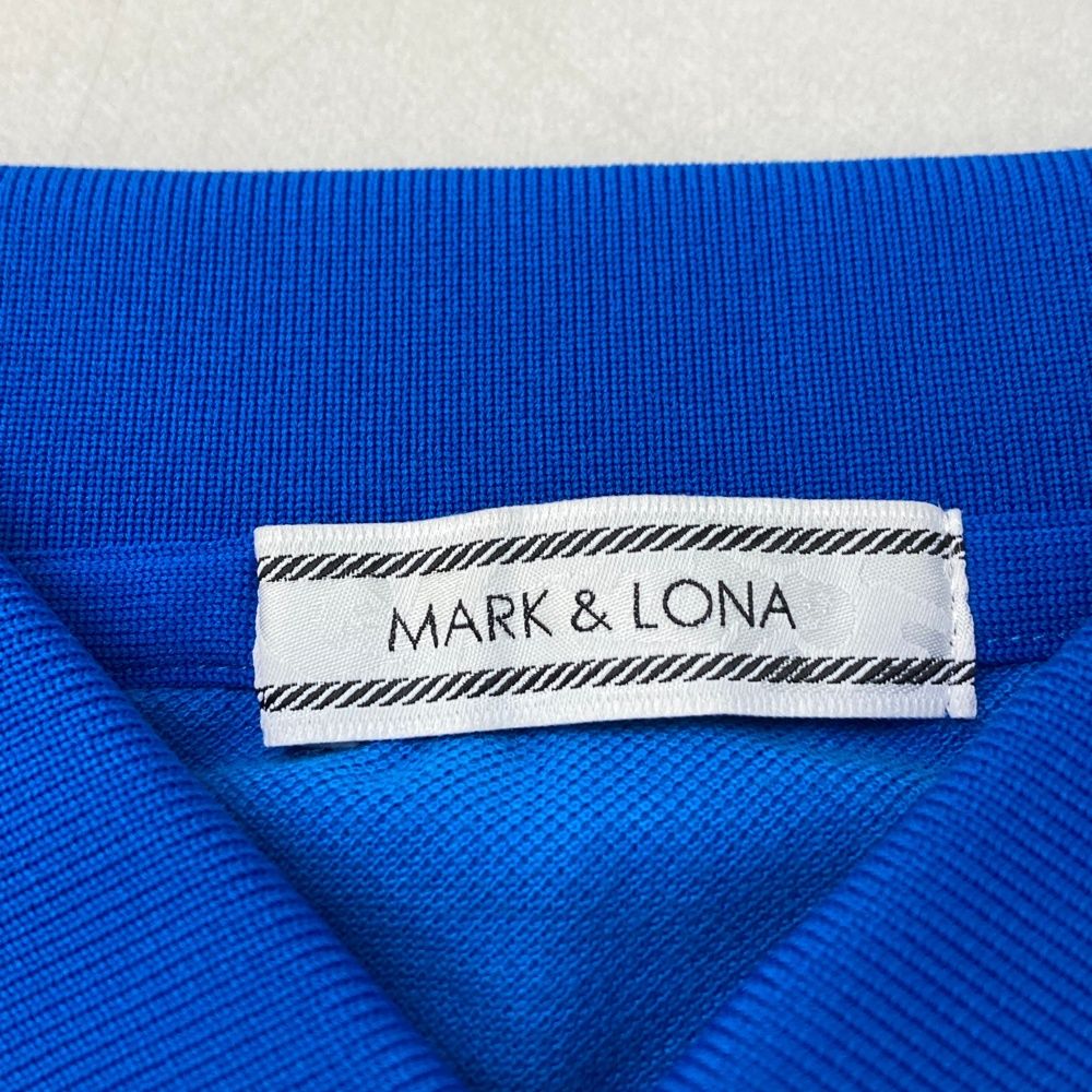 サイズ：M MARK&LONA マークアンドロナ  半袖ポロシャツ スカル 迷彩柄 ブルー系 [240001245797] ゴルフウェア レディース ストスト サイズ：M MARK&LONA マークアンドロナ 半袖ポロシャツ スカル 迷彩柄