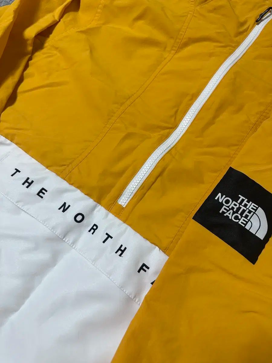 THE NORTH FACE ザ ノース フェイス イェロー ホワイト Anorak アノラック ウィンドブレーカー 100 L