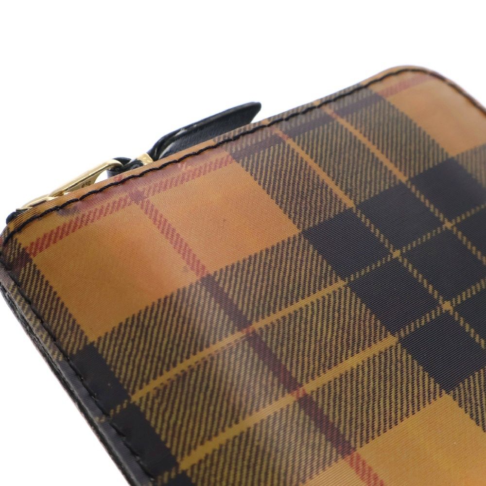COMME des GARCONS (コムデギャルソン) レンチキュラー加工チェック 