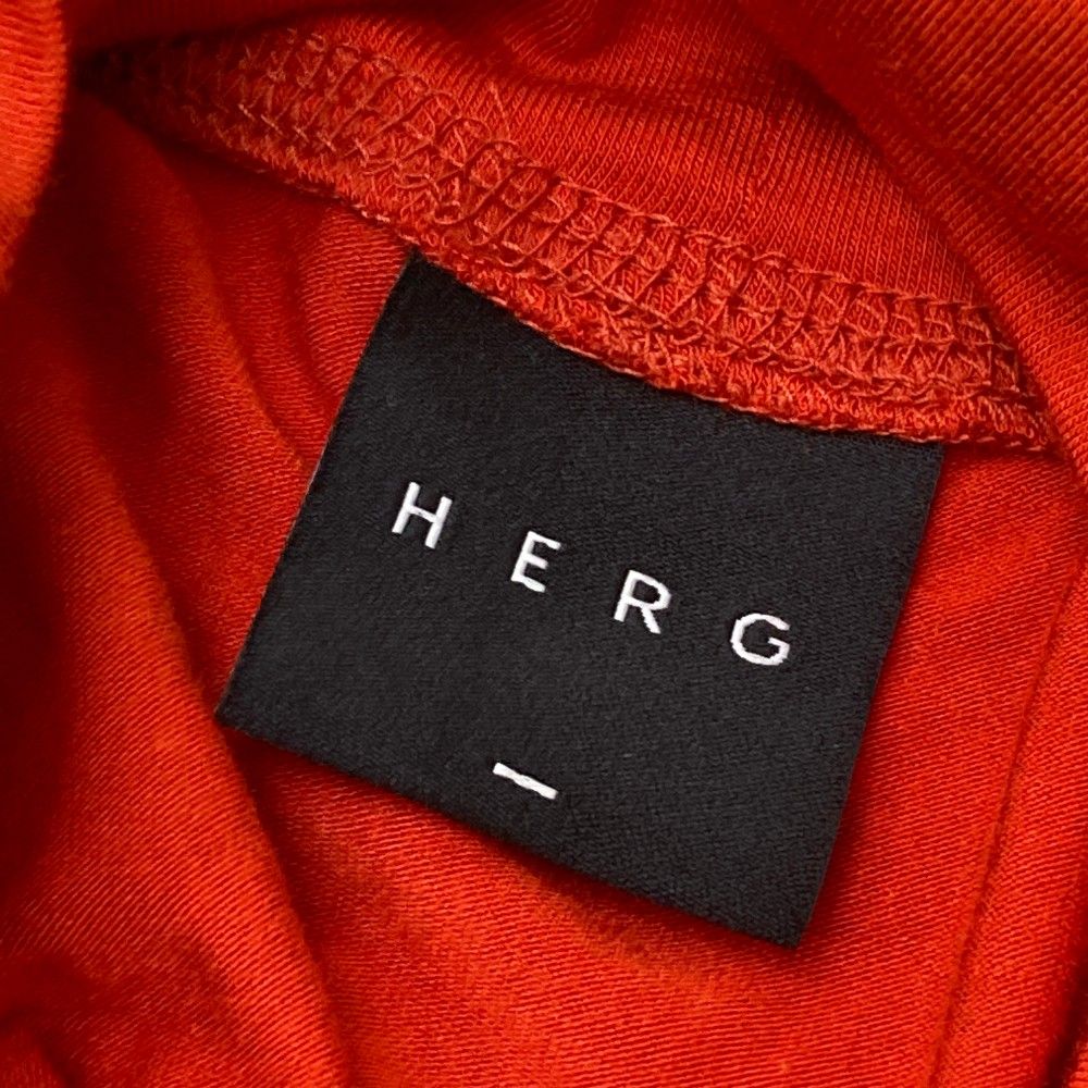 サイズ：S HERG1　エルグワン  ハイネック 長袖Tシャツ  オレンジ系 [240101477533] ゴルフウェア メンズ ストスト サイズ：S HERG1 エルグワン ハイネック 長袖Tシャツ オレンジ系