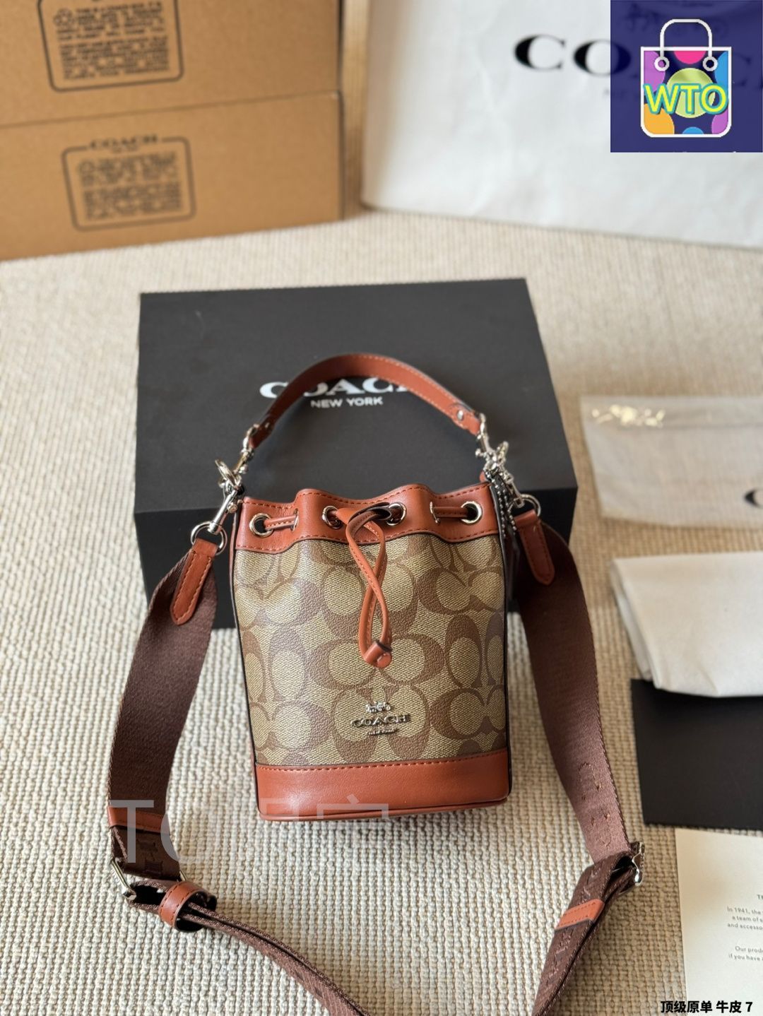 新作 COACH デンプシー ドローストリング バケット 15 国内正規品