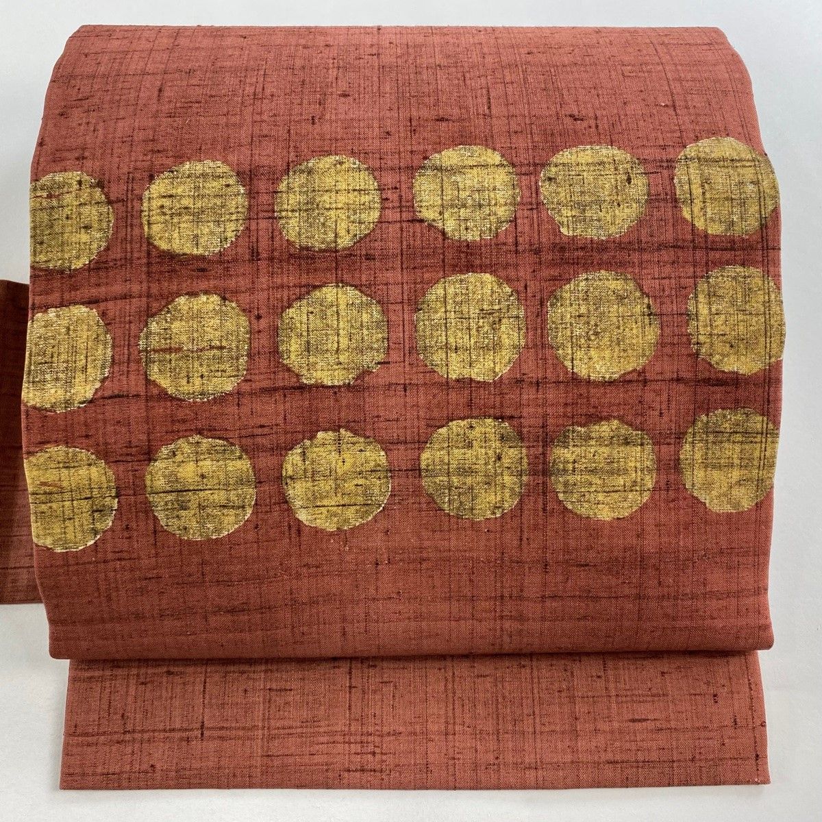 名古屋帯 秀品 紬地 丸紋 小豆色 正絹