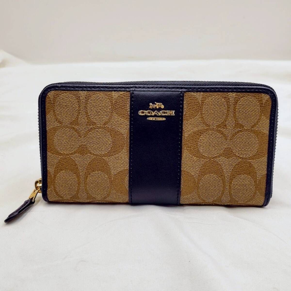 COACH ラウンドジップ長財布 F54630 ブラウン×ブラック シグネチャー ゴールド金具