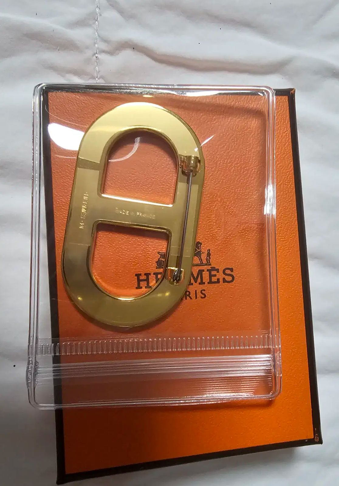 エルメス シャンダル ブローチ ヌア ゴールド