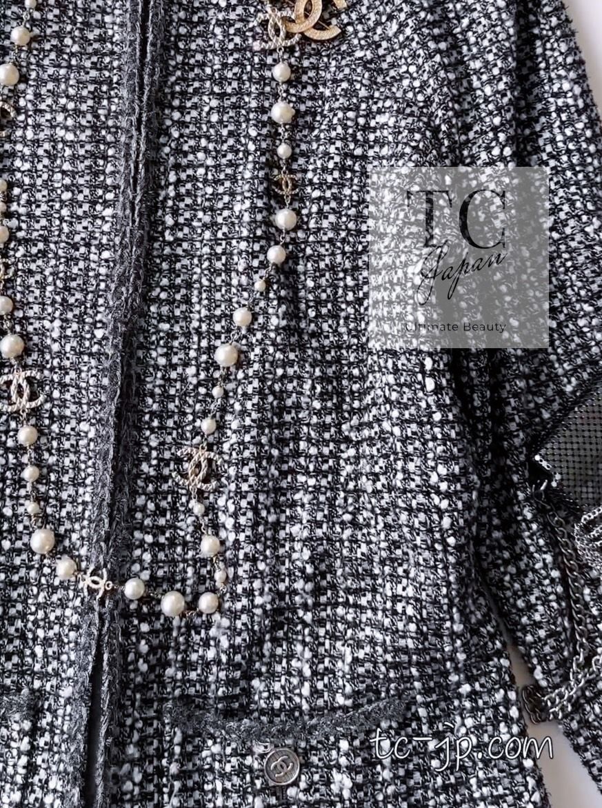 カール・ラガーフェルド　ツイード　ノーカラージャケット　ペプラム　38 シャネル ジャケット CHANEL グレー シルバー メタリック トリム