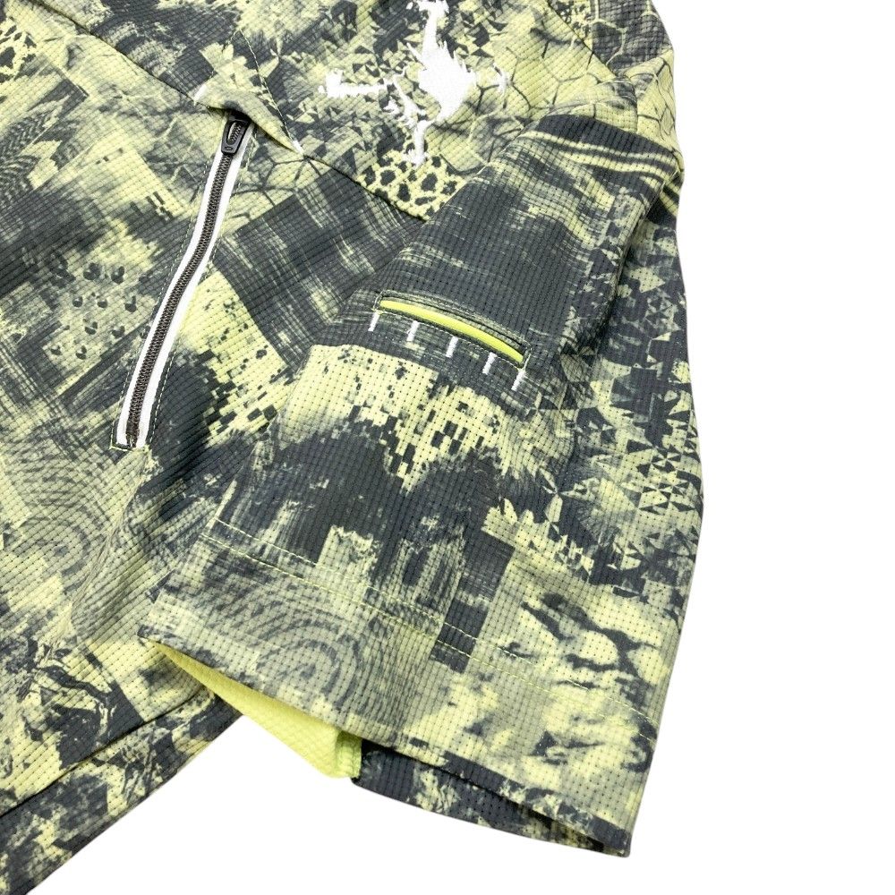 サイズ：L OAKLEY オークリー 2023年モデル ハイネック半袖Tシャツ スカル 総柄 グリーン系 [240101214720] ゴルフウェア メンズ ストスト サイズ：L OAKLEY オークリー 2023年モデル ハイネック半袖T