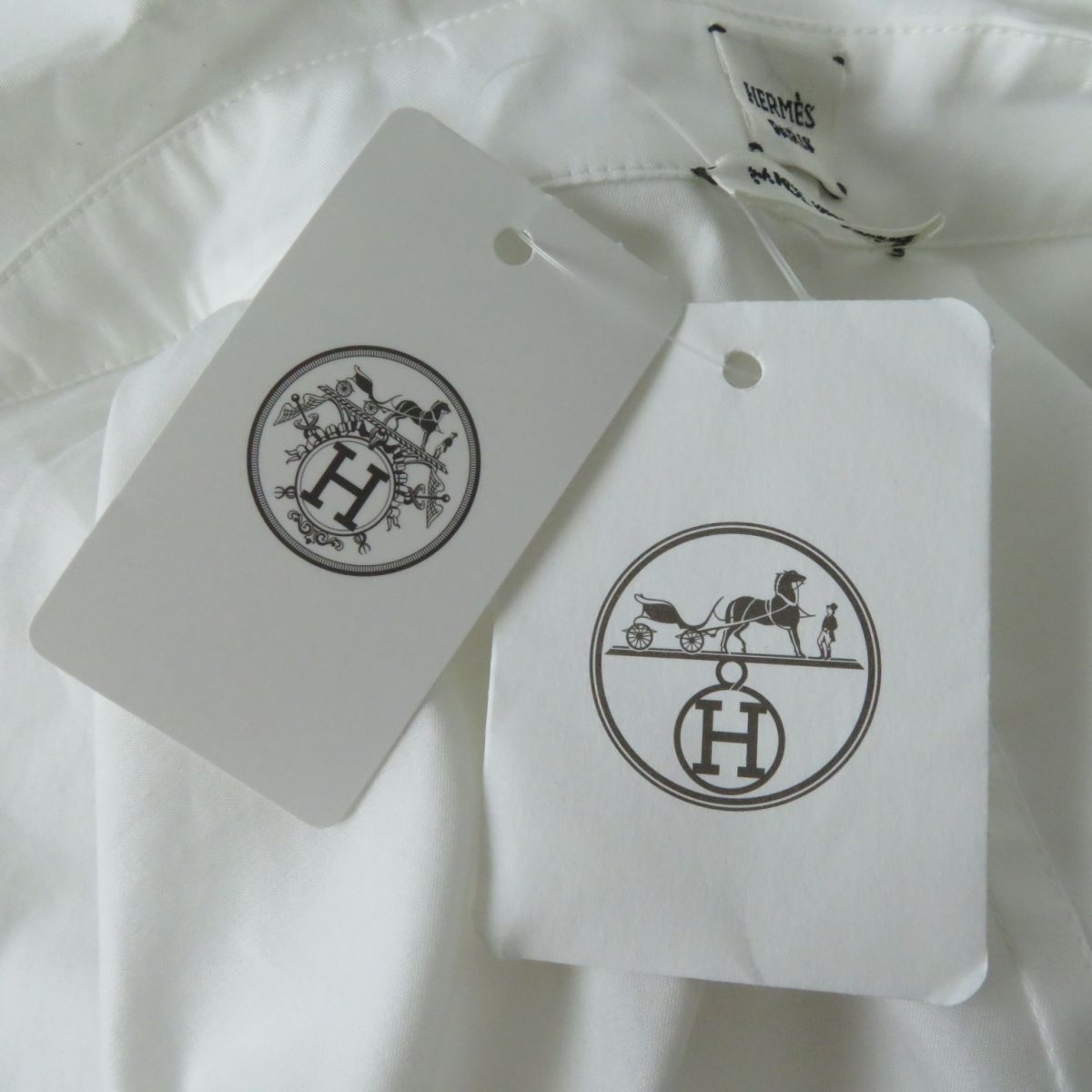 HERMES - 極美品◎正規品 フランス製 HERMES エルメス 2022年 レディース 刺繍入り セリエボタン Aライン 長袖 ロングシャツ ホワイト 白 34 タグ付 楽天市場】極美品◎正規品 フランス製 HERMES エルメス 2022年