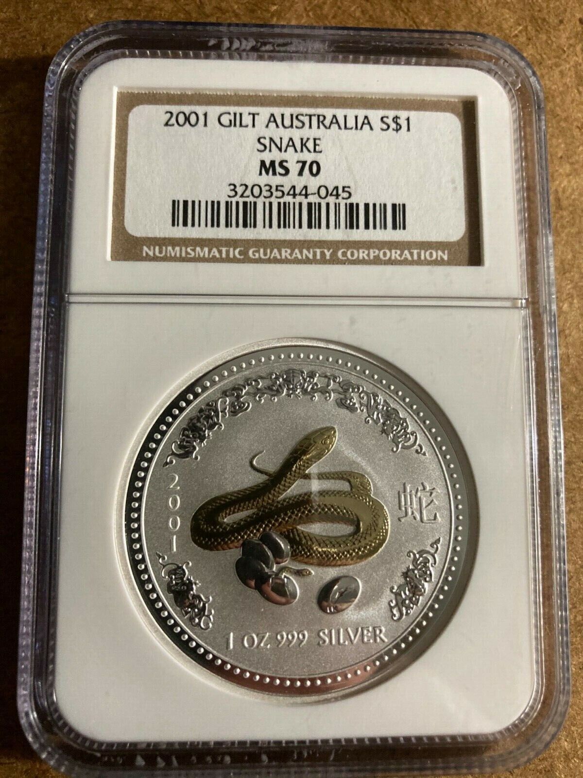 2001 Gilt Atralia Year of Snake w|eggs Silver $1 NGC MS70 Pop 9 Super?