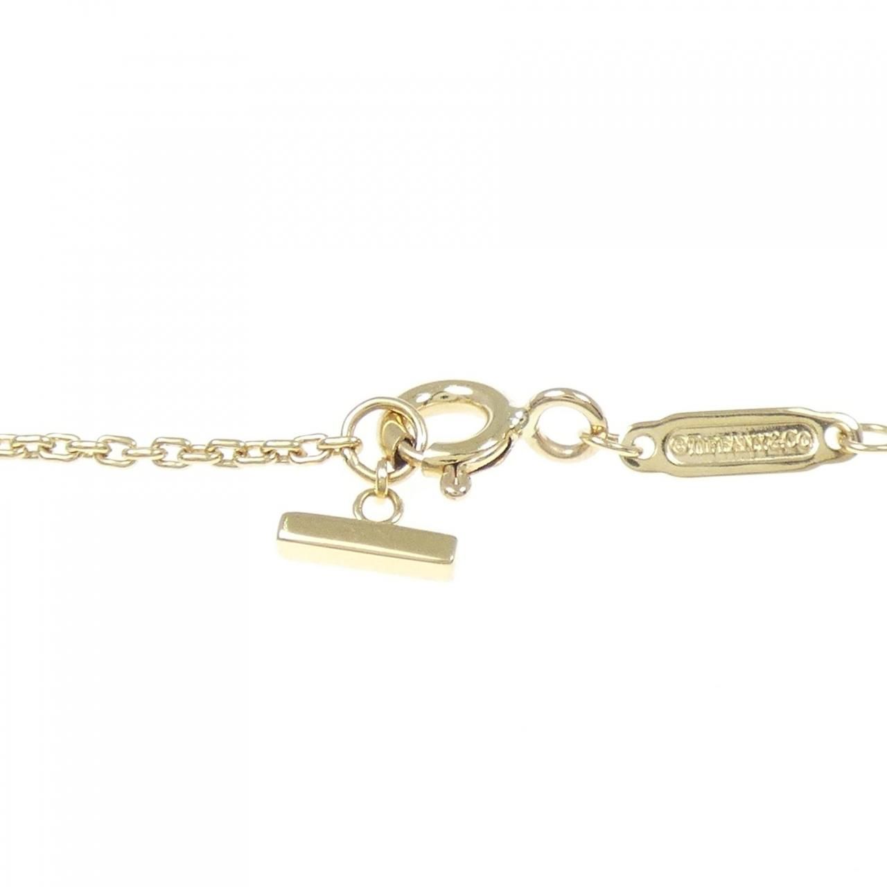 ティファニー Tスマイル ミディアム ネックレス 0.19CT - メルカリ 