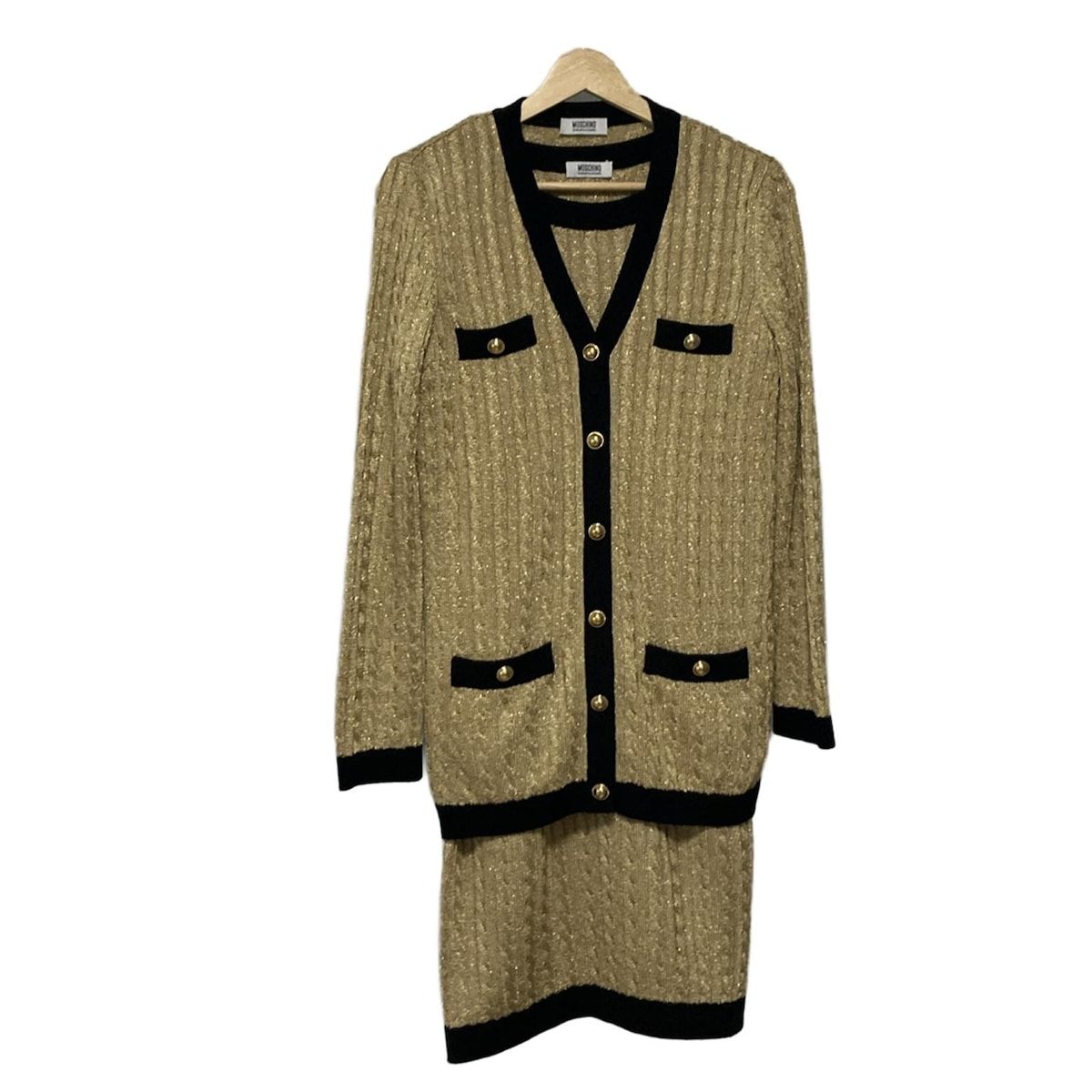 MOSCHINO モスキーノ ワンピースセットアップ レディース - ゴールド×黒 ニット
