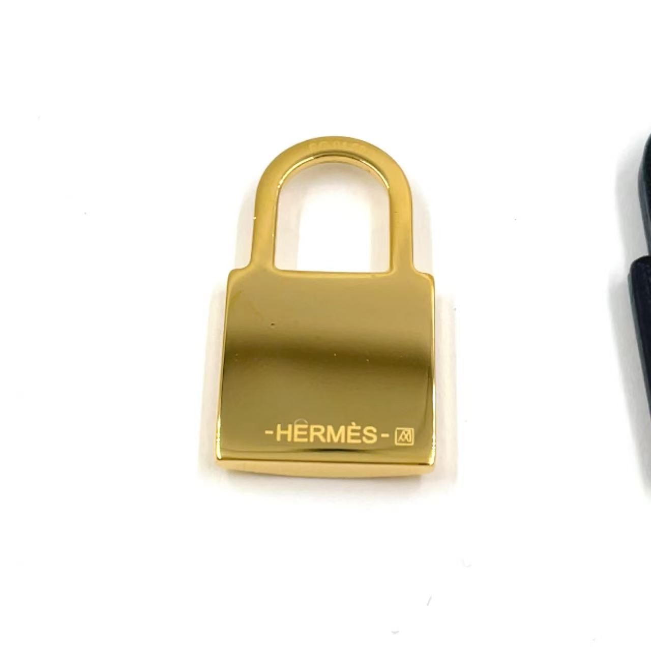 HERMES オーケリー D刻印 レザー×メタル ゴールド×ブラック 片耳のみ ピアス