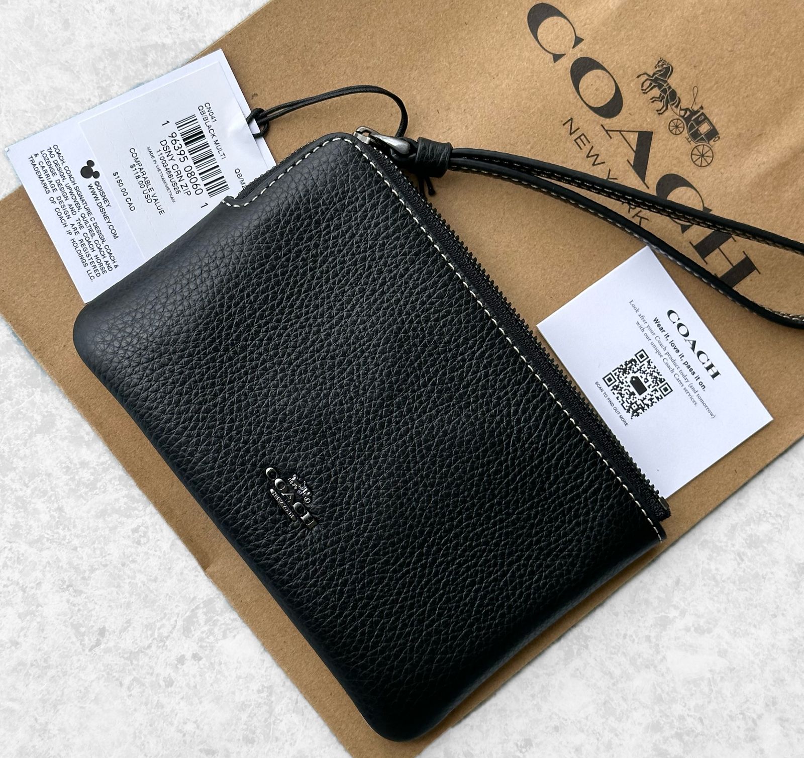 新品] ディズニー×コーチ コーナージップリストレット ウインク 