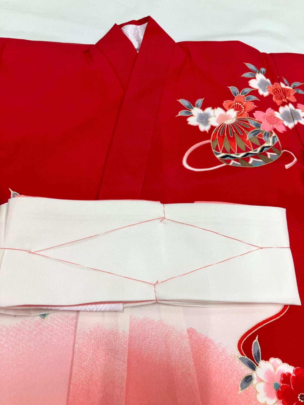 ≪花ラブリ≫ MG 682 RE このび 一つ身着物 宮参り着 鶴 つる 鞠 蝶 藤 紐付き 七五三 0～３歳 女の子 女児 赤系 レッド系 桃色系 ピンク系 初着 産着 掛け着 小裁ち 熨斗目 赤ちゃん 和装 和柄 和風