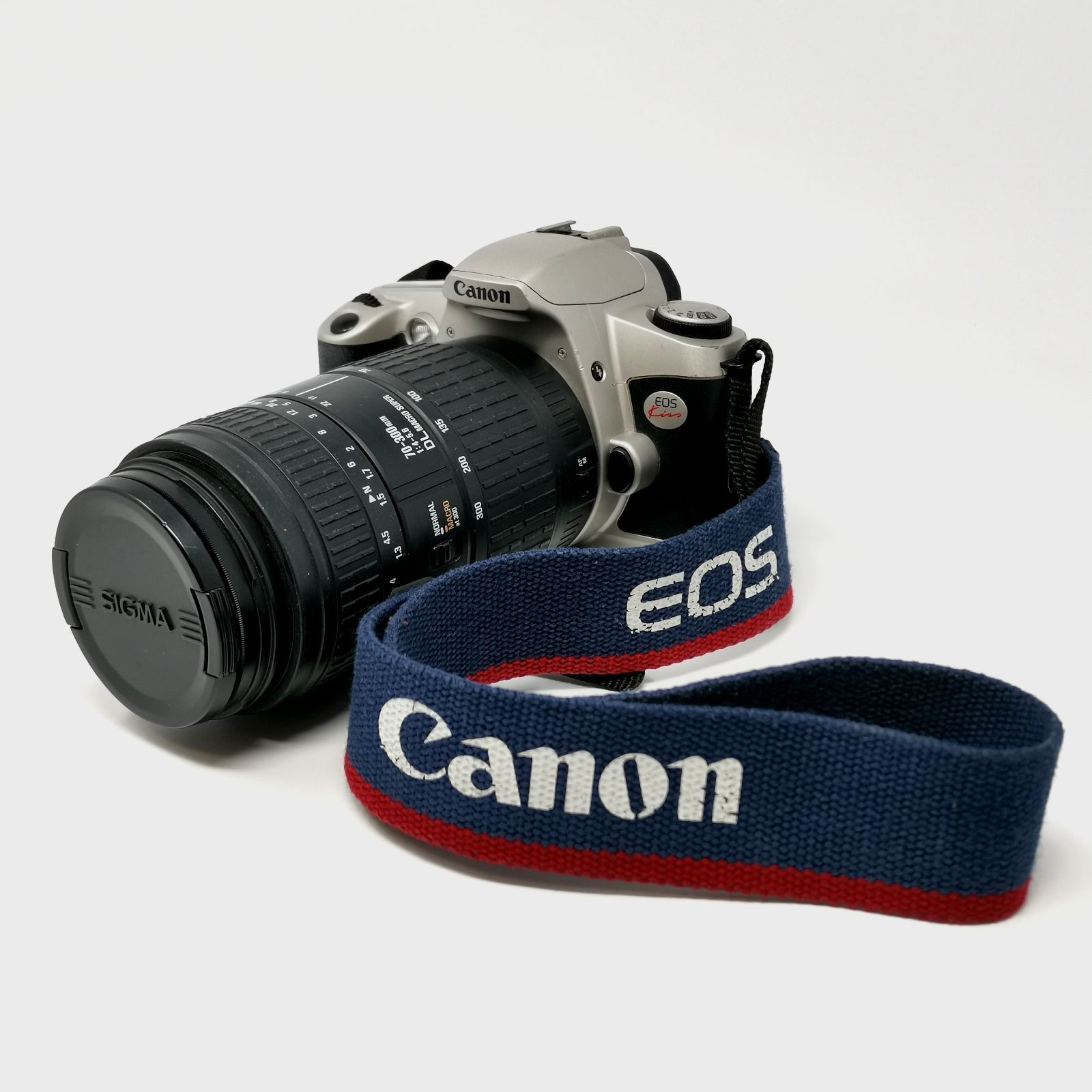 Canon EOS Kiss ブラック シルバー フィルムカメラ フィルムないため動作未 レンズ SIGMA 70-300mm 1 4-5.6 DL MACRO SUPER 管理番号KKVNKO2881