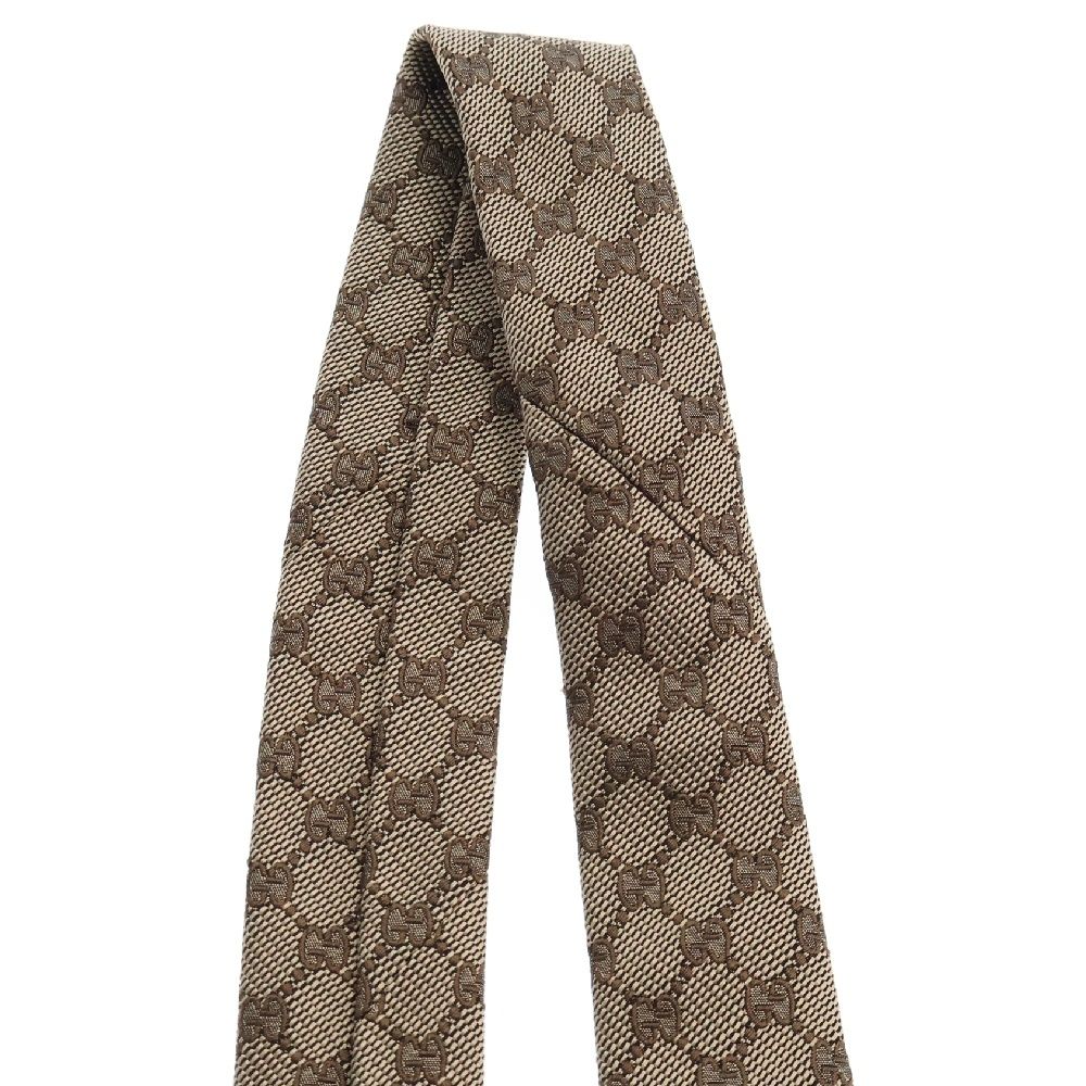 ☆美品☆GUCCI gg柄 ベージュ ネクタイ　シルク　グッチ　ロゴ GUCCI グッチ ネクタイ ARGOS 499695 4B002 メンズ シルク