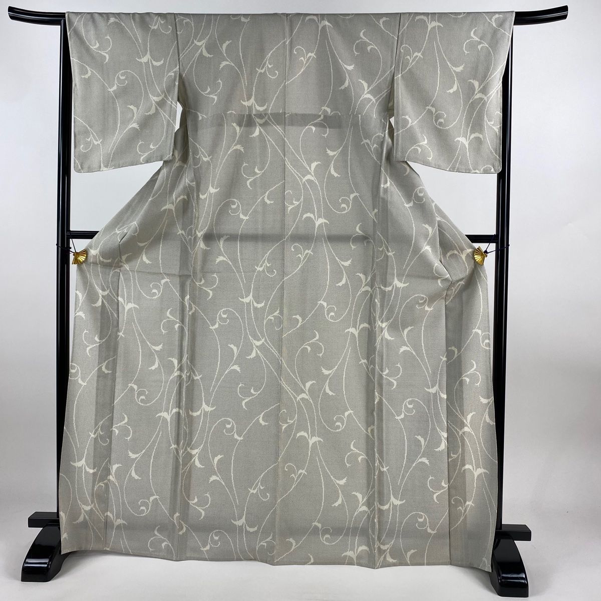 塩沢紬 身丈170.5cm 裄丈66.5cm M 単衣 越路塩澤絣 塩沢絣 証紙 唐草 亀甲絣 灰色 正絹
