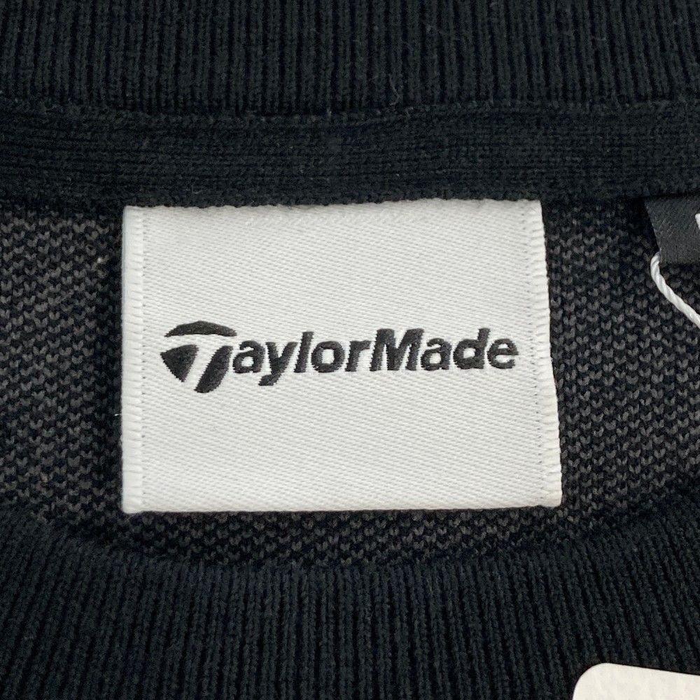 サイズ：L TAYLOR MADE テーラーメイド 2024年モデル ニットセーター ロゴ総柄 ブラック系 [240101457608] ゴルフウェア メンズ ストスト サイズ：L TAYLOR MADE テーラーメイド 2024年モデル ニットセーター