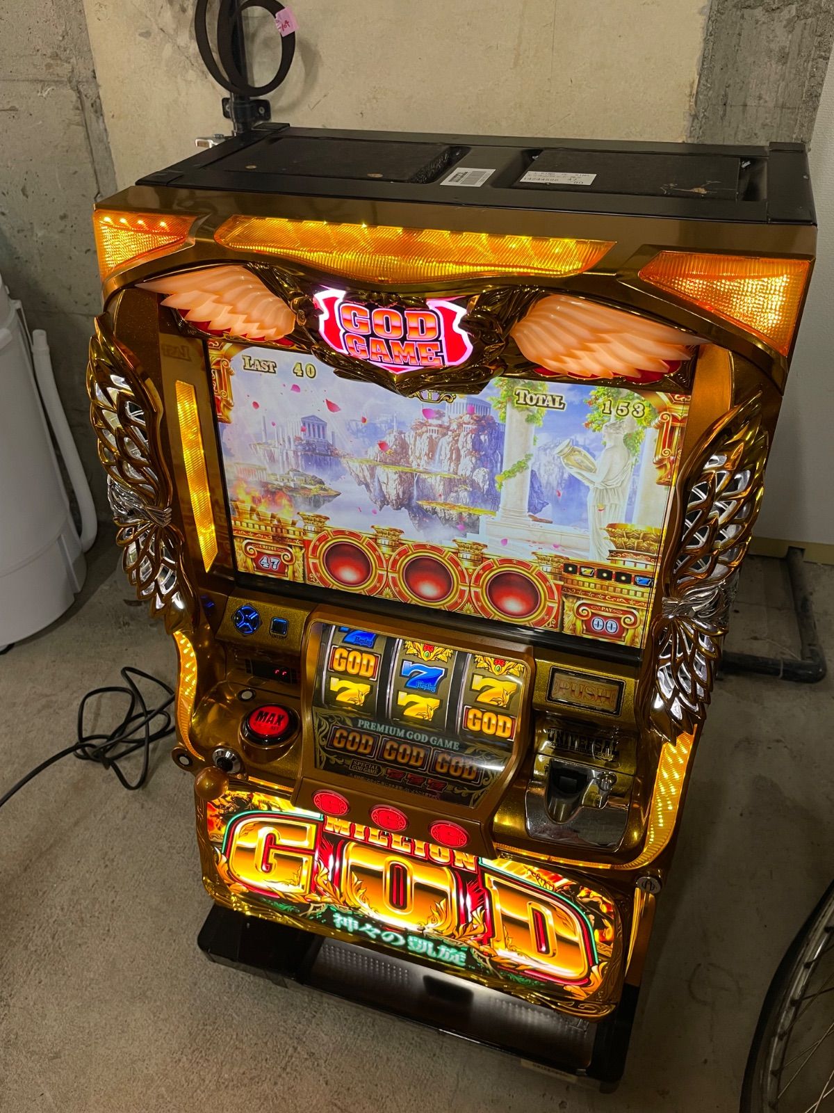 ユニバーサルブロス ミリオンゴッド-神々の凱旋- 中古パチスロ