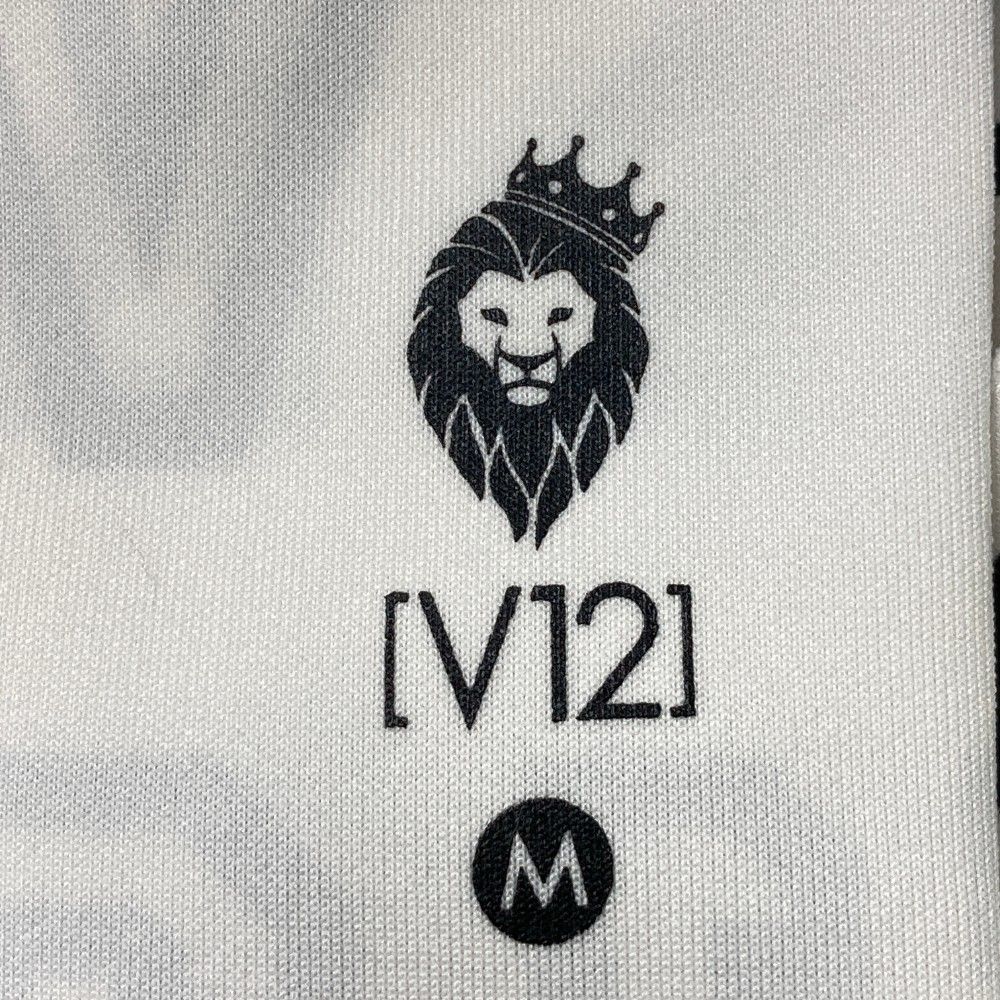 サイズ：M V12 ヴィトゥエルヴ  ハーフパンツ ロゴ総柄 ホワイト系 [240101445502] ゴルフウェア メンズ ストスト サイズ：M V12 ヴィトゥエルヴ ハーフパンツ ロゴ総柄 ホワイト