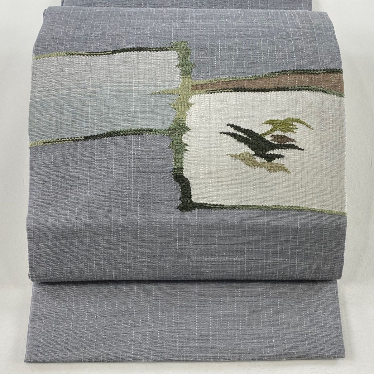 開き名古屋帯 秀品 幾何学 灰色 正絹