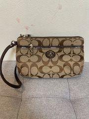 コーチ　シグネチャー　ポーチ　coach シーホース　中古