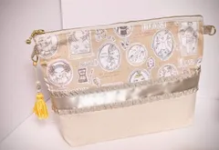 ☆ガーリー柄。少し大きめポーチ☆黄色タッセル付き。