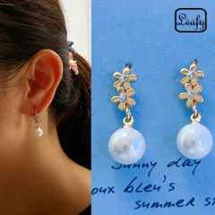 卒業式 入学式 ピアス ロングピアス ゴールド 金 フラワー 花 パール フェイクパール ラインストーン キラキラ ゆらゆら 揺れる 可憐 かわいい エレガント 上品 パーティー 結婚式 二次会 冠婚葬祭 お呼ばれ フォーマル 入園式 新生活 春コーデ 母の日