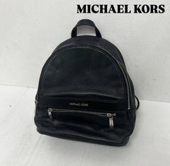美品✨Michael Kors 黒 スタッズバックパック - メルカリ