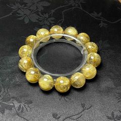 ゴールドタイチンキャッツアイルチルブレスレット 11-11.3mm 内径17cm 
