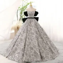 新品 高貴な印象を放つ花柄に気品と可憐さを纏うバックリボンドレス