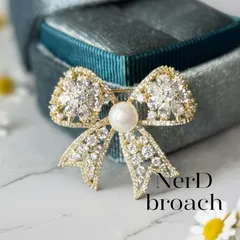 ハイエンドモデル✽ジルコニアのリボンブローチ  かわいい お呼ばれ ゴールド エレガント 上品 ギフト プレゼント 贈り物 レディース 女性 おしゃれ 大人 カジュアル フォーマル コサージュ NerD 新品未使用