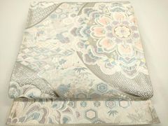 6k277 袋帯 絹 唐織 正倉院文様 華文 銀色 白 ピンク 紫 花柄 和装