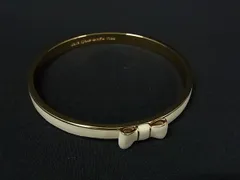 ■美品■ kate spade ケイトスペード リボン バングル ブレスレット アクセサリー レディース アイボリー系×ゴールド系 DK7879