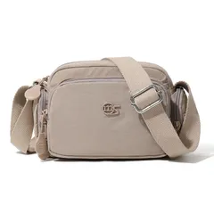 レディースバッグ2025冬の新モデルの多層ポケット斜めショルダーバッグ都市のシンプルで軽いナイロンの布の小包のショルダーバッグ