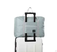 折りたたみトラベルバッグ ブルー コンパクト 軽量 スーツケースに装着可 旅行用のサブバッグ 送料無料 ＜新品＞ [94482]