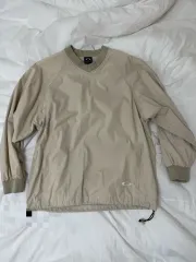 オークリー ウィンドブレーカー ベージュ s