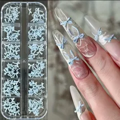 数量限定　ケース入り　リボン　水色　ネイルパーツ