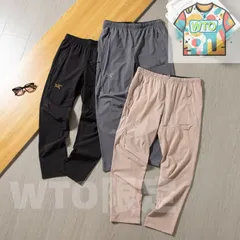 始祖鳥（アークテリックス）の長パンツ パッチワークで多ポケットのレジャー刺繍入り長パンツ 